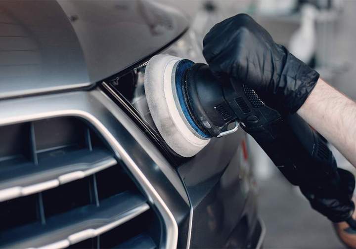 man polish car garage